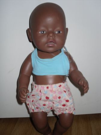 korte broek met blauw topje 43 cm