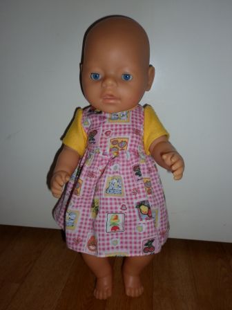 jurkje met figuurtjes en gele mouwen 40-43 cm