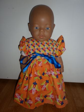 oranje jurk met bloemen 43-48 cm