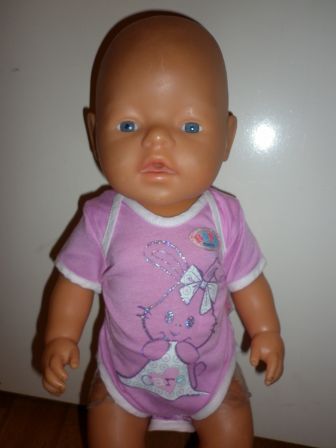 roze romper met konijn 43 cm