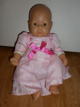 lichtroze jurk met roze strik 32-36 cm