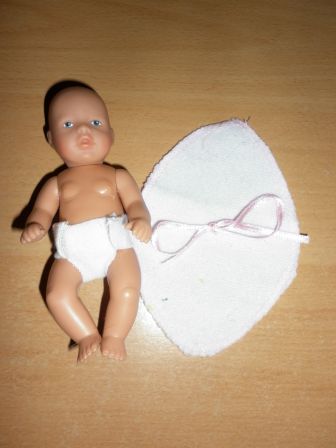 wit doekje met roze strik en bies