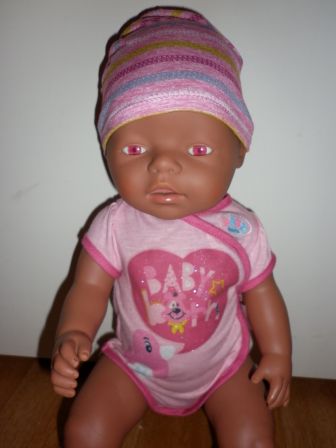 romper met hondje/eendje en muts 43 cm