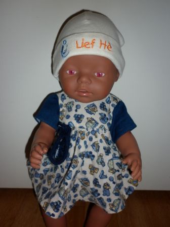 jurkje met print (speelgoed) en muts 43 cm