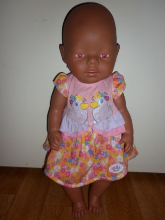 roze/bloem jurkje met eendjes 43 cm