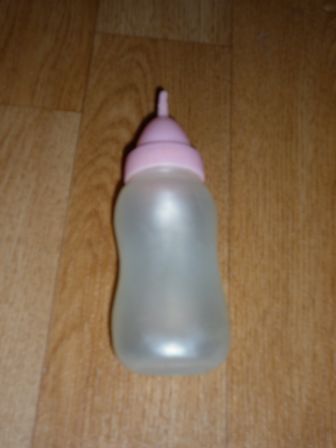 doorzichtig flesje met roze dop