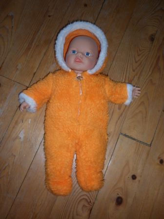 oranje buitenpak 32-36 cm