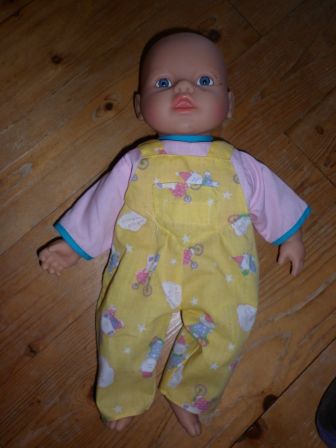 geel boxpakje met fietsjes 32-34 cm