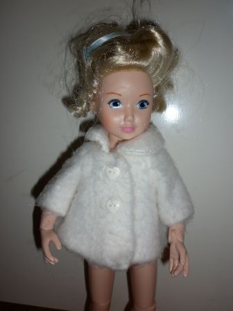 zacht jasje met hartjesknoopjes 38 cm