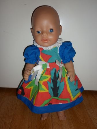 gekleurde overgooier met blauw bloesje 43 cm