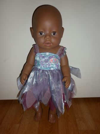 bruine soft touch baby born 43 cm met paarse jurk