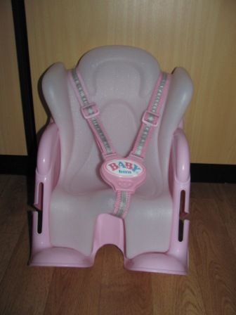 roze/witte autostoel/fietsstoel