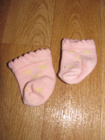 roze sokjes met gele figuurtjes