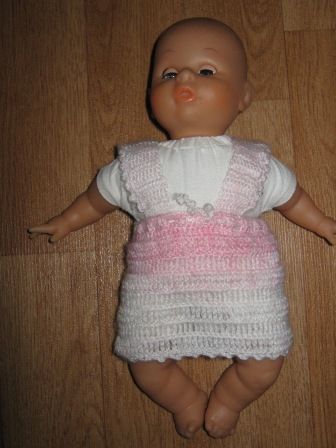 roze/wit jurkje 27 cm