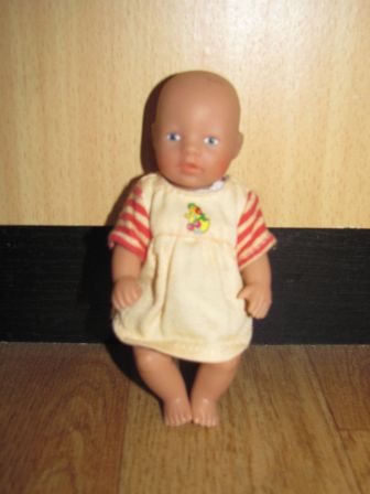 geel jurkje met eendje 11 cm