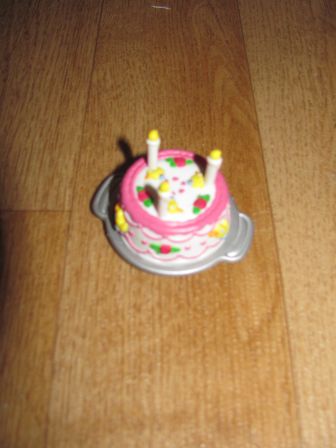 verjaardagstaart met kaarsjes (mini baby born)