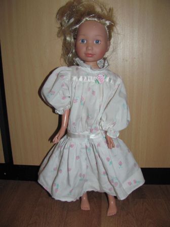 jurkje met roosje 42 cm Tween