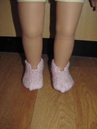 roze gebreide schoentjes/slofjes 50 cm Girls Only