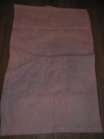 roze handdoekje voor de pop