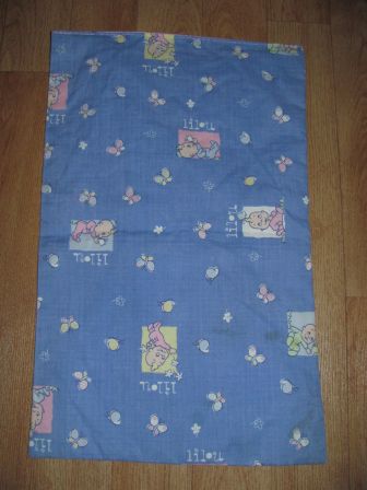 Lilou dekentje voor het poppenbed