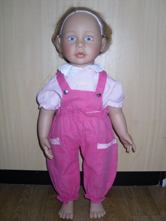 roze tuinbroek met bloesje 50 cm Girls Only