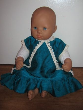 blauwe jurk met wit kant