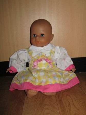 jurkje met geel/wit/roze 27 cm