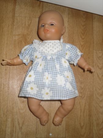 blauw/bloem jurkje 27 cm