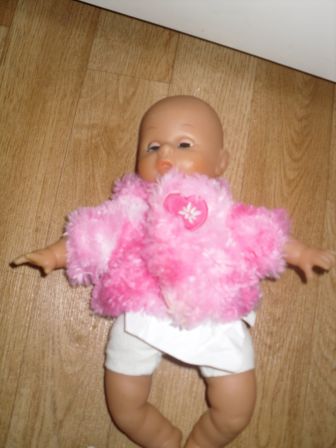 roze wollig jasje 25-27 cm